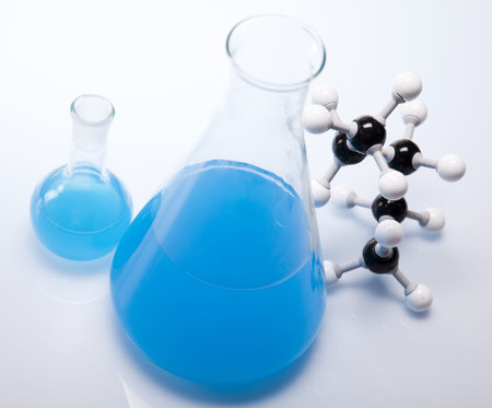 Laboratory glassware containing colorful liquid