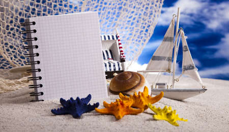 Copyspace blank paper on white beachの写真素材