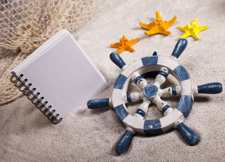 Copyspace blank paper on white beachの写真素材