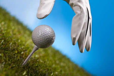 Hand and golf ballの写真素材