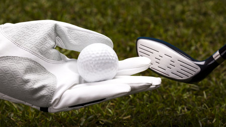 Hand and golf ballの写真素材
