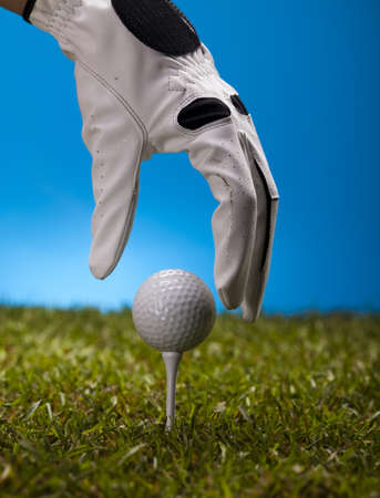 Hand and golf ballの写真素材