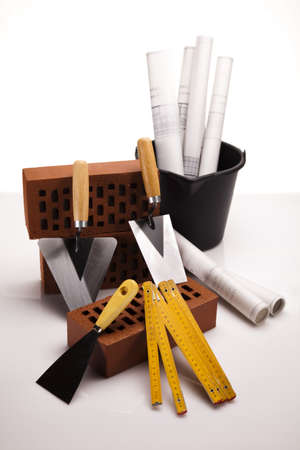 Brick, trowel tool and Construction plansの写真素材
