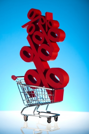 Shopping cart with sign of percentage, saleの写真素材