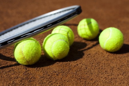 Tennis racket and balls, tennis courtの写真素材