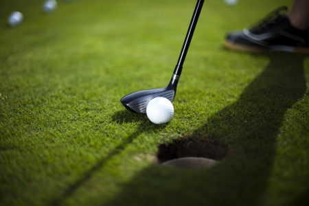 Golf ball on green grassの写真素材