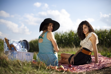 Young women on nature picnicの写真素材