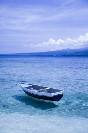 Boat on the blue lagoon of Gili Air, Indonesia の写真素材