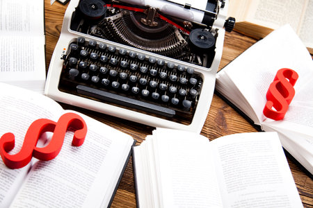 Vintage typewriter on old bookの写真素材