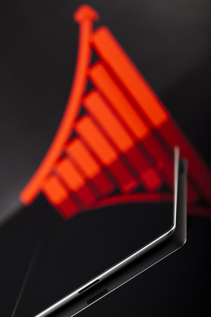 Computer tablet with financial graphの写真素材