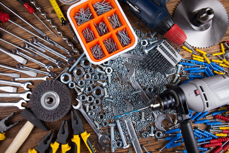 Working tools on wooden background