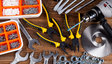 Set of different tools on wooden background