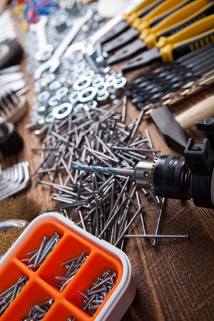 Working tools on wooden background
