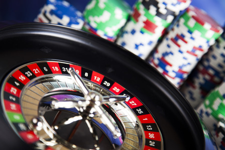 Roulette in casino and Poker Chipsの写真素材