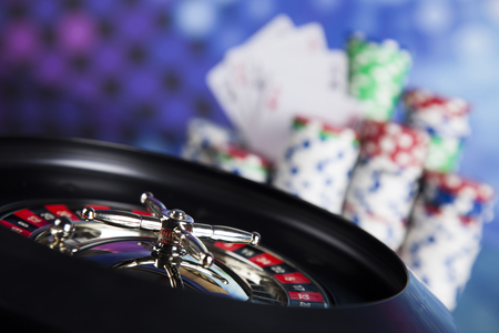 Casino roulette and playing chipsの写真素材