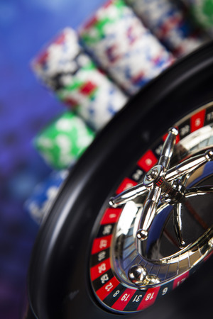 Roulette in casino and Poker Chipsの写真素材