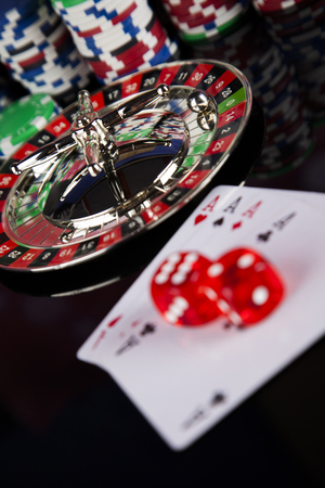 Poker Chips on a gaming with casino rouletteの写真素材
