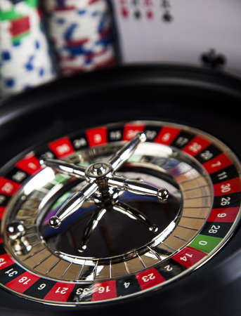 Casino roulette and playing chipsの写真素材