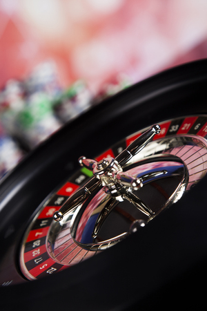 Casino roulette and playing chipsの写真素材