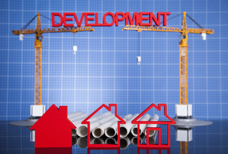 Buildings under construction and cranesの写真素材