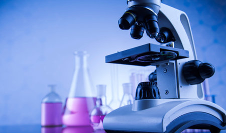 Microscope in medical laboratory glassware