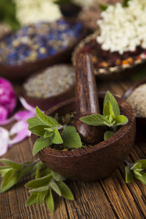 Natural medicine, wooden table backgroundの写真素材