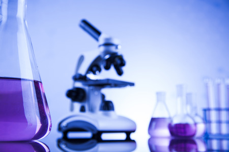 Laboratory work place with microscope and glasswareの写真素材