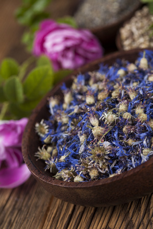 Herbal medicine, wooden table backgroundの写真素材