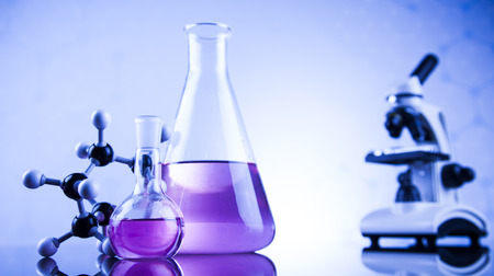 Laboratory work place with microscope and glasswareの写真素材