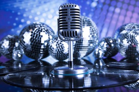 Music background, microphone and Disco Ballsの写真素材
