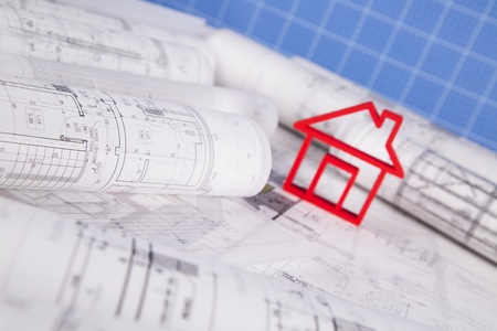 Architectural project and Yellow helmet and house modelの写真素材