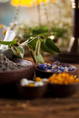 Natural medicine on wooden table backgroundの写真素材