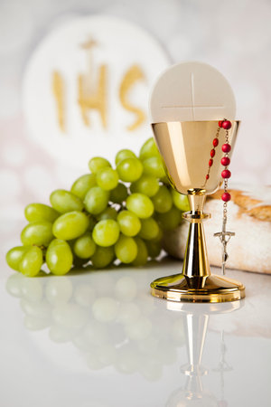 Holy communion elements on white background