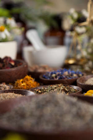 Fresh medicinal, healing herbs on woodenの写真素材