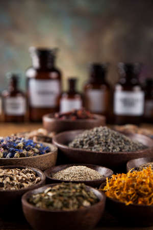 Herbal medicine on wooden desk backgroundの写真素材