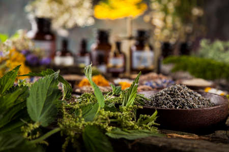 Natural medicine on wooden table backgroundの写真素材