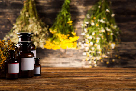 Herbal medicine on wooden desk backgroundの写真素材