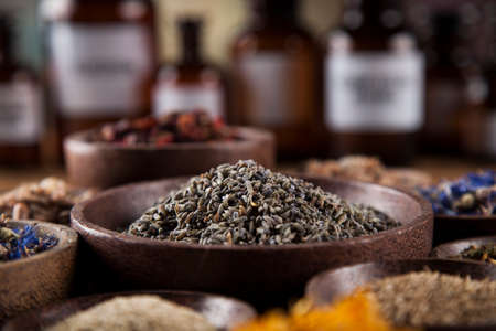 Fresh medicinal, healing herbs on woodenの写真素材