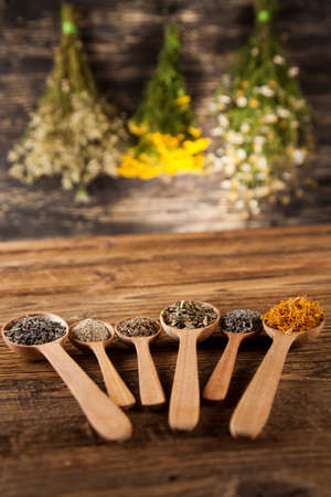 Herbal medicine on wooden desk backgroundの写真素材