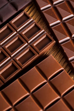 Bars Chocolate , candy sweet, dessert food on wooden backgroundの写真素材