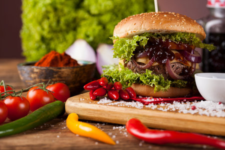 Home made hamburge, wooden desk backgroundの写真素材