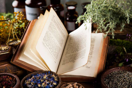 Natural medicine on wooden table backgroundの写真素材
