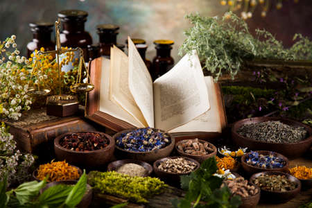 Natural medicine on wooden table backgroundの写真素材