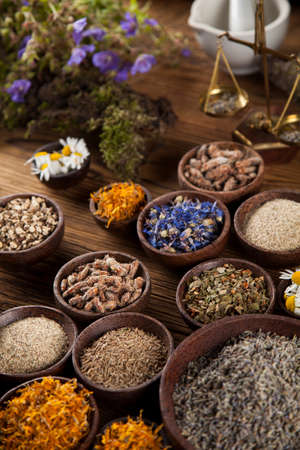 Natural medicine on wooden table backgroundの写真素材