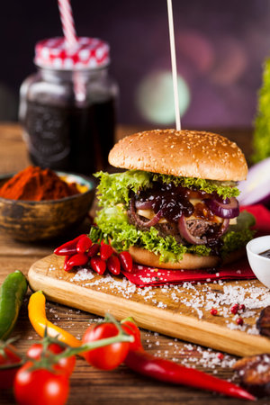 Closeup of homemade hamburger with fresh vegetablesの写真素材