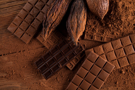 Cocoa pod and chocolate bar and food dessert background