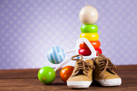 Children's of toy accessories on wooden background