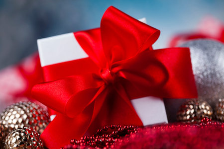 Gift box with red ribbon, Holiday Christmas background