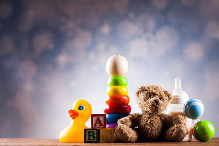 Cute teddy bear on wooden backgroundの写真素材