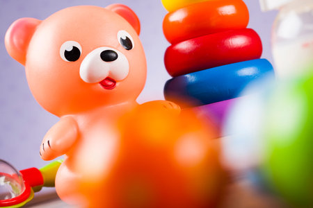 Baby World toy collection on on wooden background